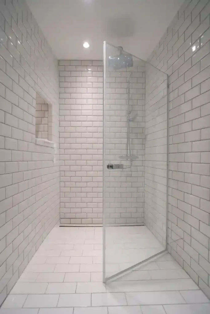 Add a Glass Shower Curtain or Clear Liner